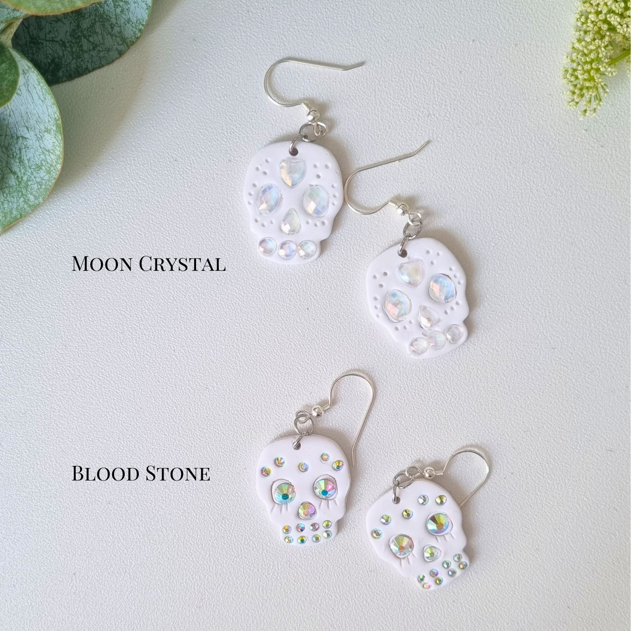 White Skull Dangle Earrings with Rhinestones